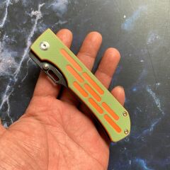 Kansept Reedus | Yeşil ve Turuncu G10 Sap | Siyah TiCN Kaplamalı ve Taşlanmış 154CM Çelik Çakı | T1041A3